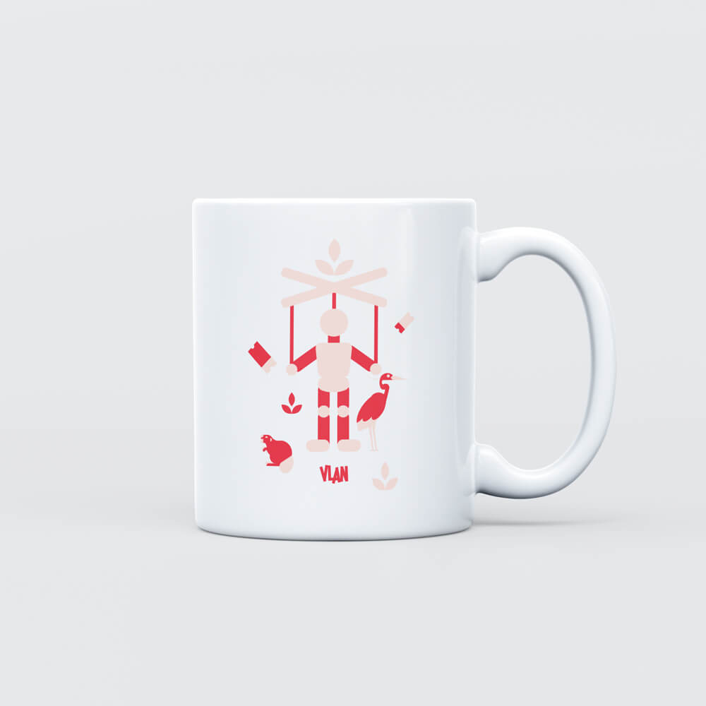 Mug avec design représentant une marionnette et la Place Ducale de Charleville-Mézières, symbole de l'art de la région.